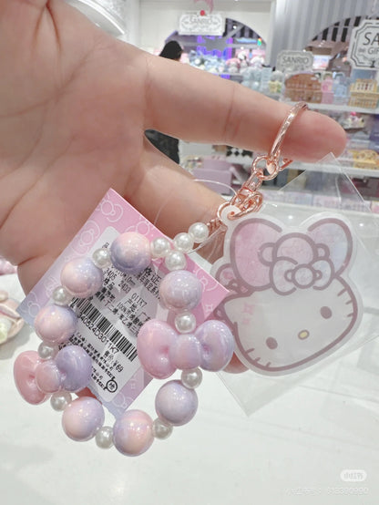 HelloKitty凯蒂猫｜Keychain Key Holder Birthday 50th Fashionable Ribbons Sanrio50周年生日限定彩虹渐变偏光色蝴蝶结串珠+珍珠贝母脸型吊饰钥匙扣/挂件｜约W7×D0.5×H7cm