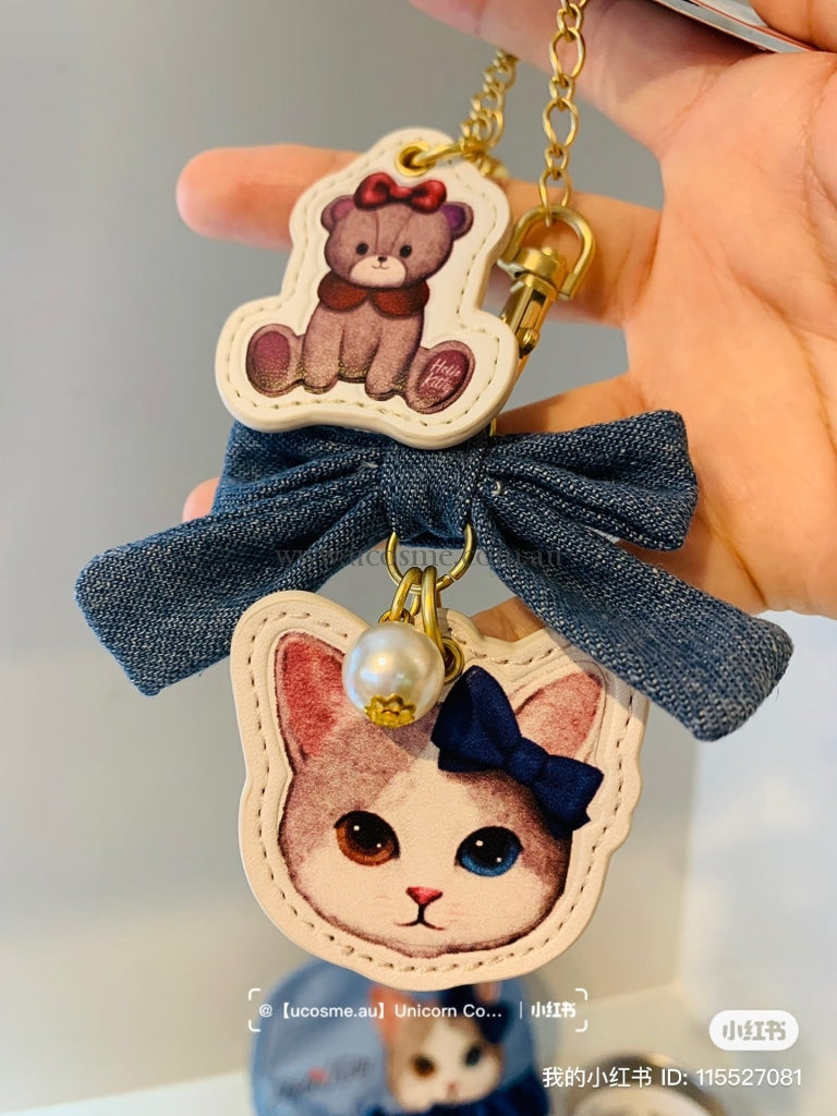 Hello kitty凯蒂猫|USJ 新版kitty皮质珍珠蝴蝶结挂件 – Unicorn Cosmetics